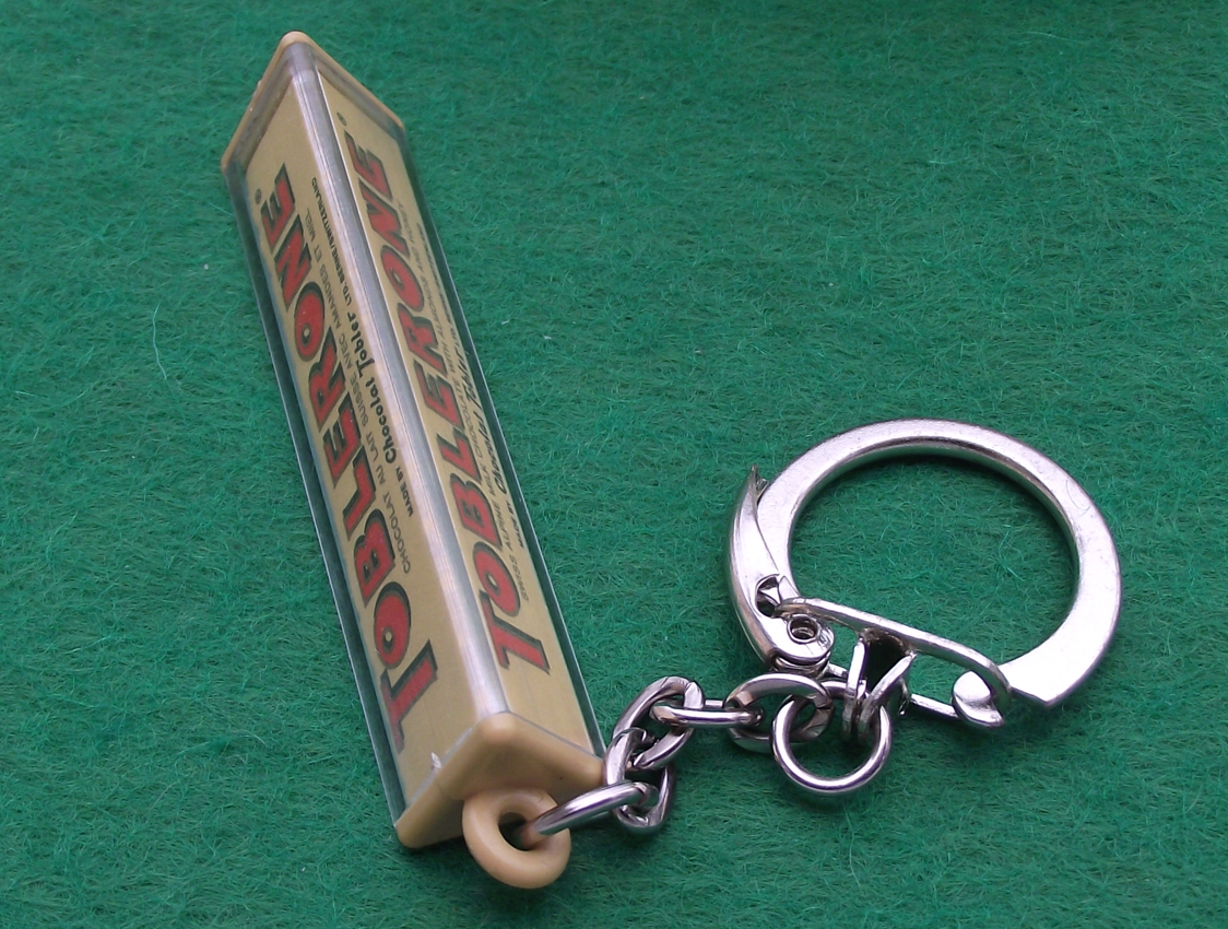 Vintage Swiss Toblerone Chocolate Triangle Advertising Keychain - Badgecrazy