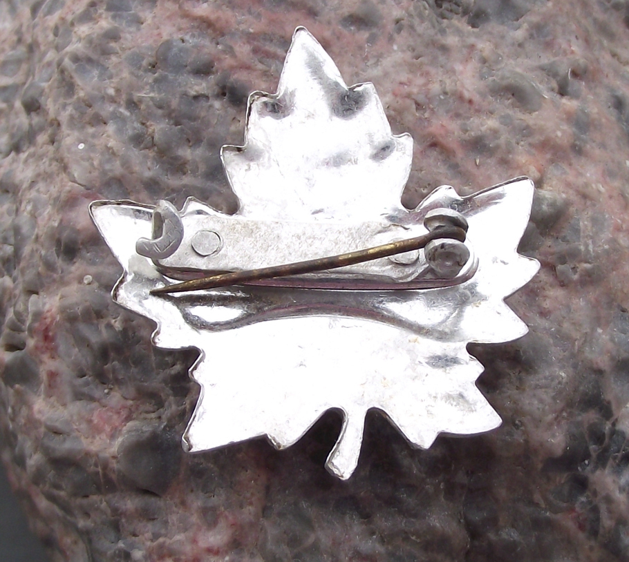 Vintage Silver Canada Text Textured Maple Leaf Canadian Pin Badge - Badgecrazy