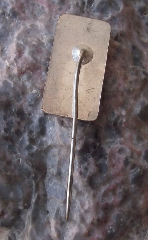 Vintage Tesla Holesovice Unhappy Man with no Electric Lightbulb Candle Pin Badge