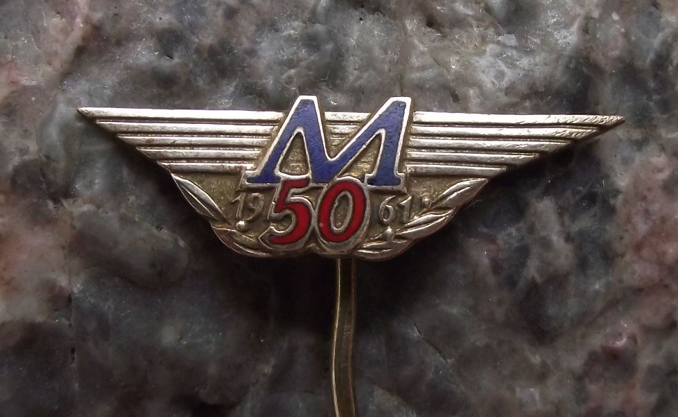 1961 Winged Flying Letter M 50 Logo Safety Match Maker Matchboxes Pin Badge - Badgecrazy