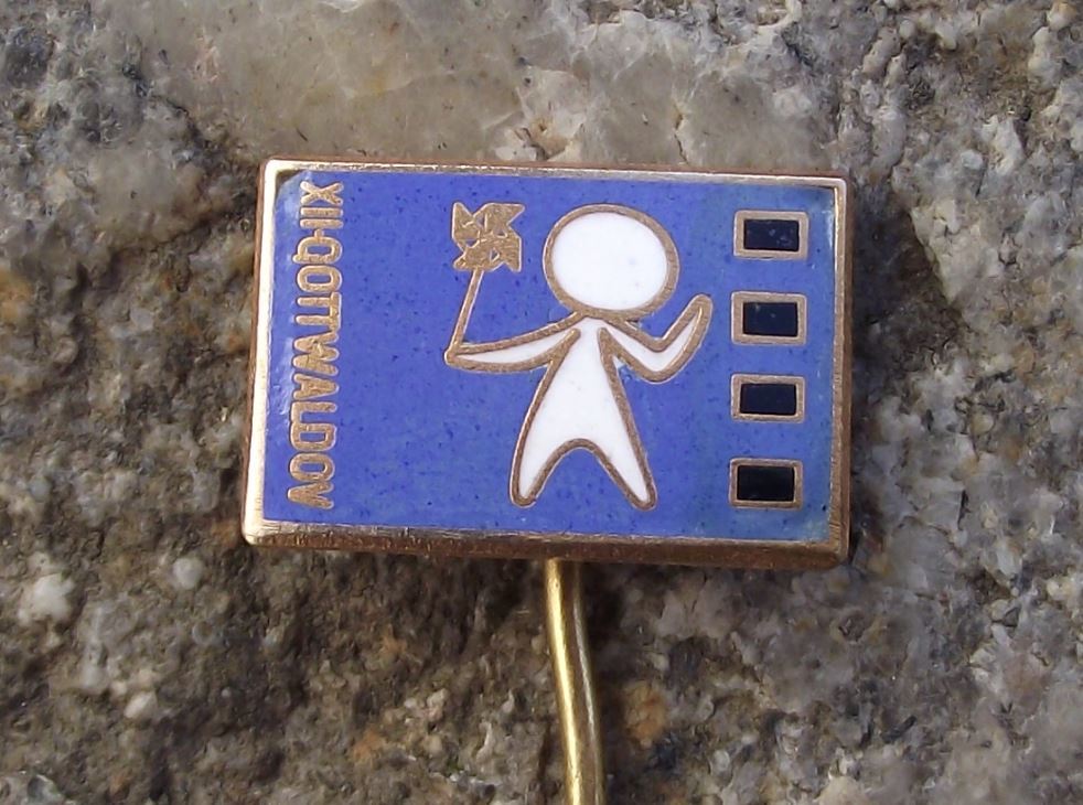 1973 Gottwaldov Film Festival Zlin Movie Reel & Child Holding Flower Enamel Pin - Badgecrazy