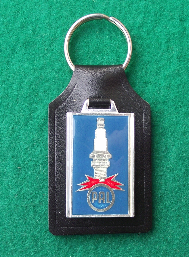 Vintage PAL Brisk Motokov Czechoslovakia Spark Plug Company Key Ring