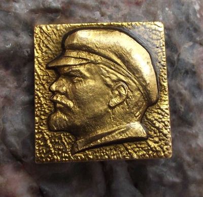 Vladimir Lenin wearing Trademark Leather Peaked Cap Russian Communist Pin Badge
